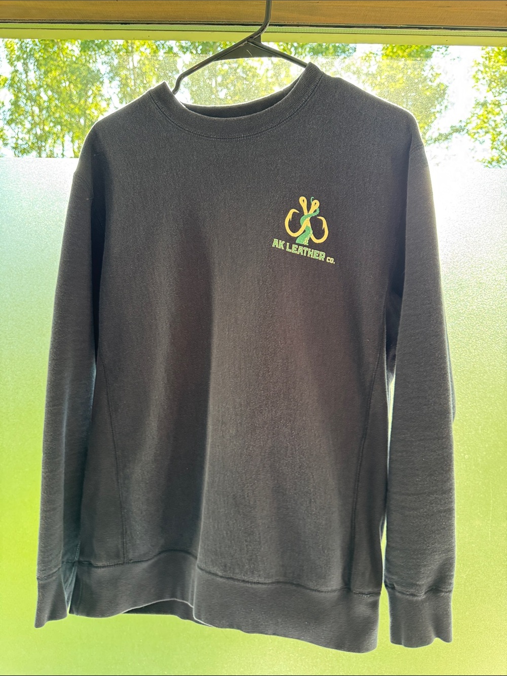 AK LEATHER Co. Black Crewneck Sweatshirt with Yellow Logo